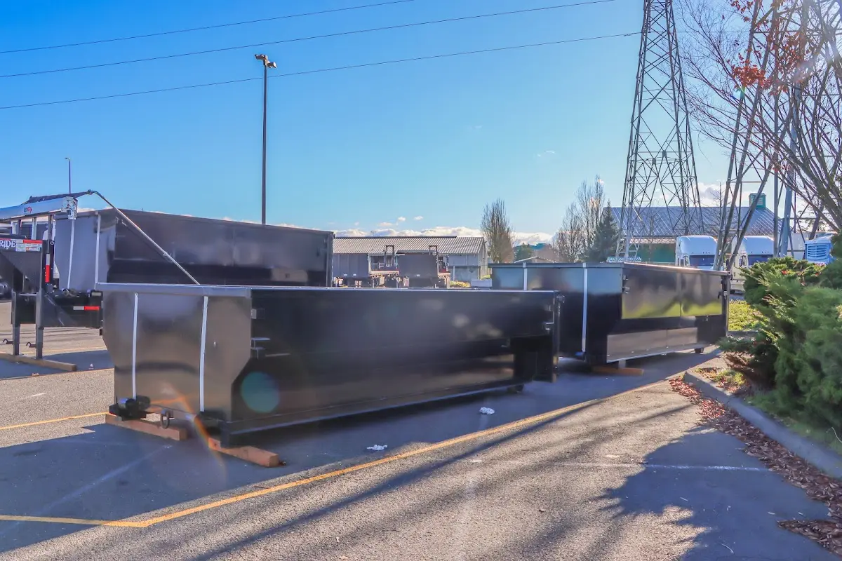 Roll-off dumpster ready for waste disposal at job site for 2 Yard Dumpster Rental in North Aurora